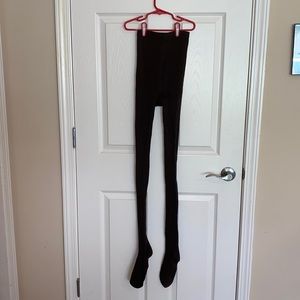 One pair of women’s brown footed tights